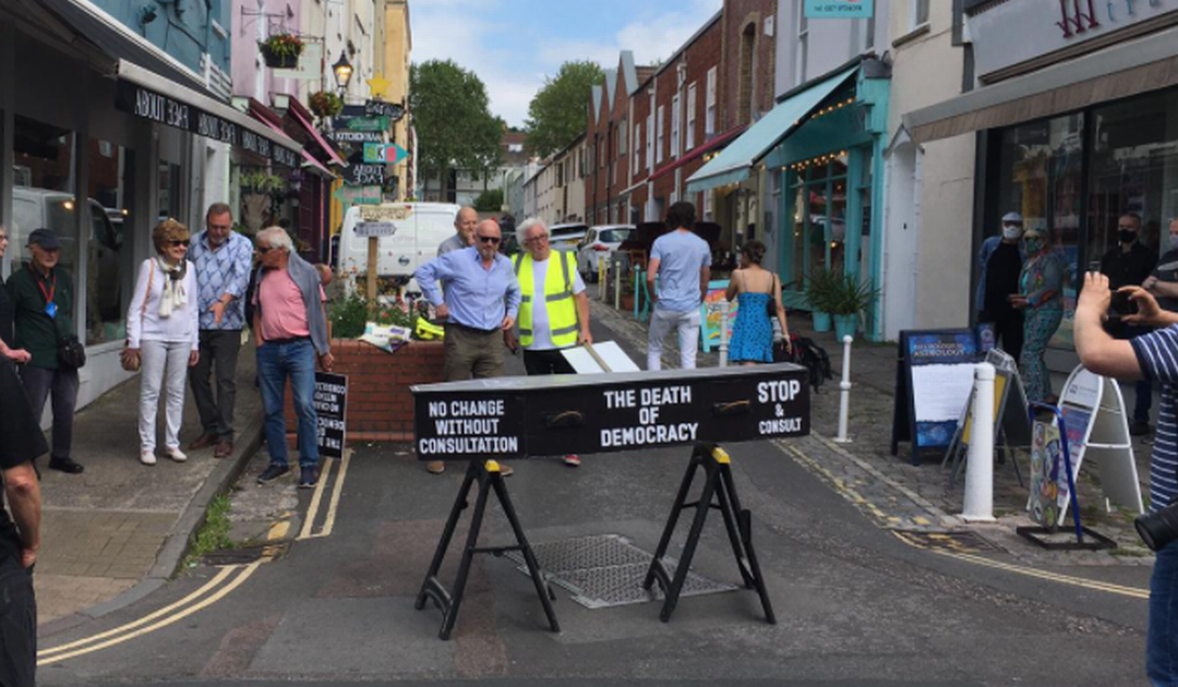 Clifton protesters against pedestrianisation block traffic with coffin – live updates