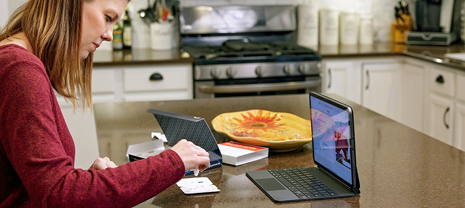 Travelers experiencing long wait times with BinaxNow COVID-19 test kit